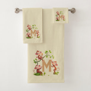 Trois jolis singes et monogramme doré sur beige