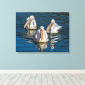 Trois pélicans ferment l'impression de toile (Insitu (Plancher de Bois))