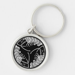 Trois porte-clés langoustes épineuses tête-bêche