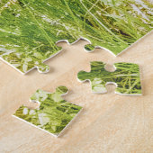 Trois tortues sur un puzzle de rondin (Côté)