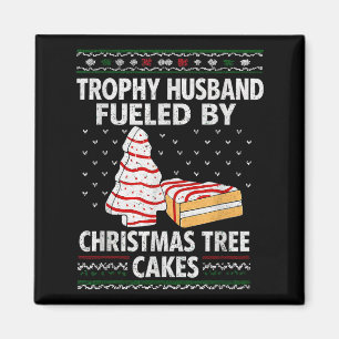 Trophy-echtgenoot aangedreven door kerstboomcakes magneet