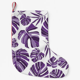 Tropical violet monstera leaves seamless pattern w kleine kerstsok