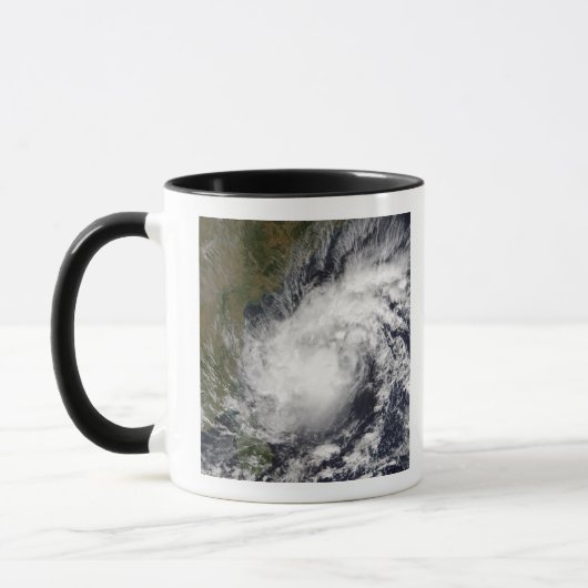 Tropisch Cyclone Baaz Mok (Links)