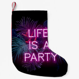Tropisch feest, neon palmbladeren. kleine kerstsok