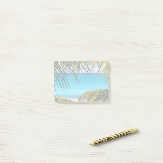 Tropisch strand met handpalmen post-it® notes (Op bureau)