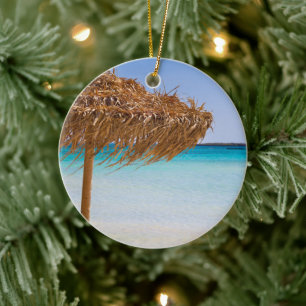 Tropisch strand met rieten parasol keramisch ornament