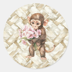 Tropische aap met orchideeën ronde sticker