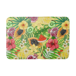 Tropische mix-fruit, bloemen en bladeren op geel badmat