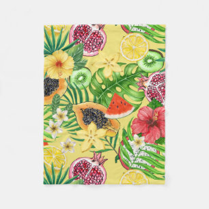 Tropische mix-fruit, bloemen en bladeren op geel fleece deken