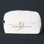 Trousse De Toilette Nom du script du monogramme or<br><div class="desc">Emportez votre style partout où vous allez avec cet élégant kit de dopp monogramme. Conçu avec des initiales or gracieuses jumelées à un nom serif raffiné, il allie sophistication moderne et fonction quotidienne. Idéal pour transporter du maquillage et d'autres petits objets tous les jours ou pour des nuitées. Ce petit...</div>