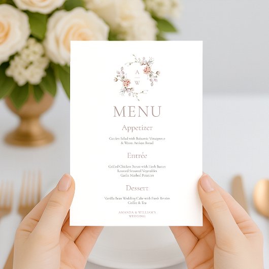 Trouwmenu met bloemend monogram aan beide zijden kaart