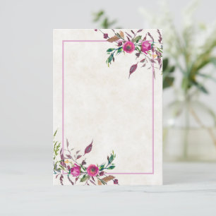 Trouwuitnodiging met roze losse bloemen op een leg kaart