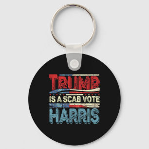 Trump is een schurkenstem Harris Wheimer 2024 Kama Sleutelhanger