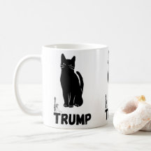 Trump mokken met zwarte kat