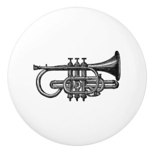 Trumpet-hoornmessen, muziekstuk keramische knop