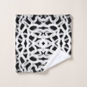 Tubulure blanche sur fond noir (Gant de toilette)