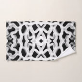 Tubulure blanche sur fond noir (Serviette à main)