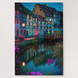 Tudor Cottage huis 's nachts aan de rivier in Fran Legpuzzel
