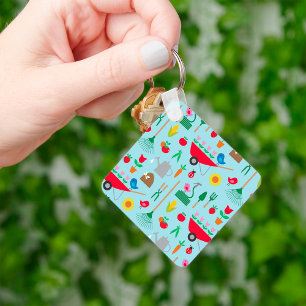 Tuinpatroon lente bloemen en tuin gereedschap sleutelhanger