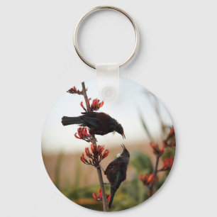 Tuinvogels op de Nieuw-Zeelandse vlasvlas struik Sleutelhanger