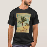 Turks Caicos T-shirt Vintage voyage - Plage<br><div class="desc">T-shirt Turks Caicos avec un palmier sur une plage de sable bleu ciel et océan. Ce tee-shirt Vintage Turks Caicos cool fait un grand cadeau !</div>