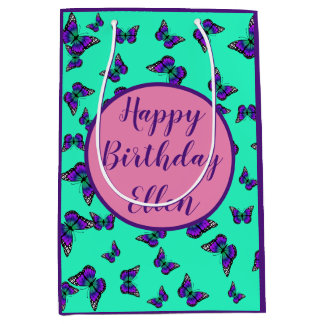 Turquoise cadeautas met paarse vlinders