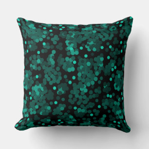 Turquoise groen polka dot patroon op zwart kussen