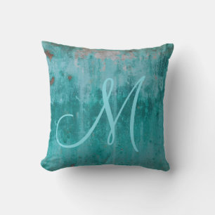 Turquoise roest monogram kussen