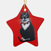 Tuxedo chat avec ornement de collier cardiaque (Gauche)