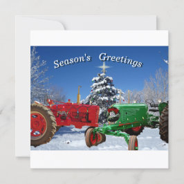 Twee antieke tractoren op een sneeuwkaart met kers feestdagenkaart