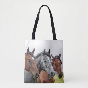 Twee bays en een grijze, drie paarden in een rij tote bag