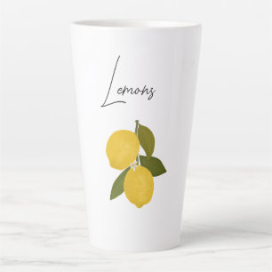 Twee citroenen met groene bladeren   Verse citrus Latte Mok