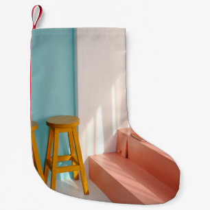 Twee gele houten stooten kleine kerstsok