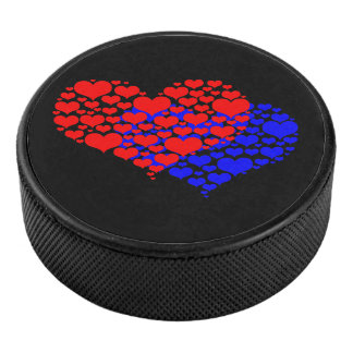 Twee harten blauw en rood hockey puck