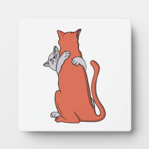 Twee katten sluiten vriendschap fotoplaat