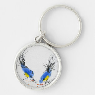 Twee kleine titmouses die graan pikken. Calligrafi Sleutelhanger