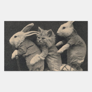 Twee konijntjes en een kat op een scooter Sticker