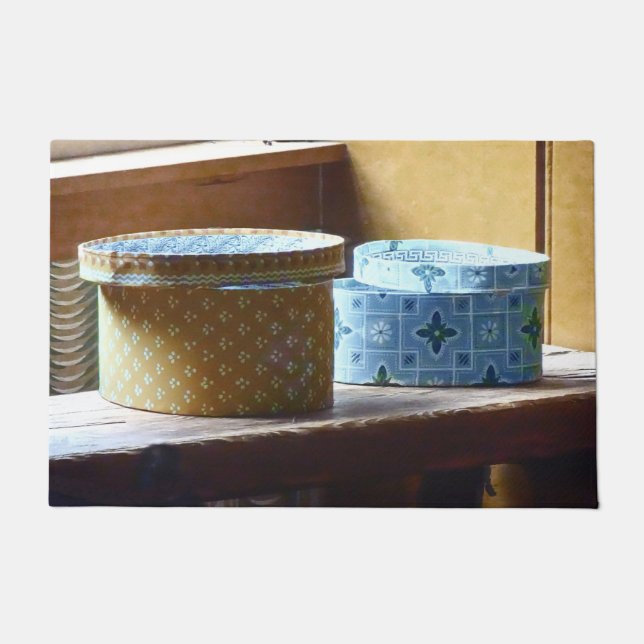 Twee Petten dozen Deurmat (Voorkant)