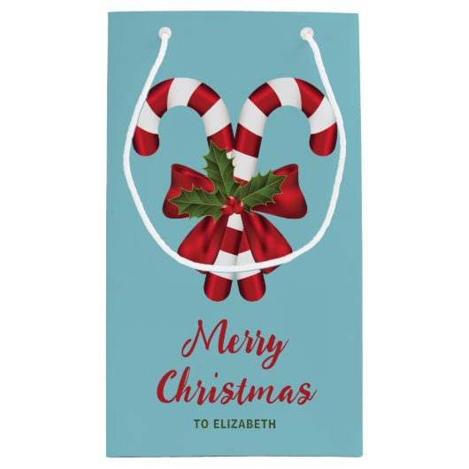 Twee rode en witte snoepjes met tekst klein cadeauzakje (Achterkant)