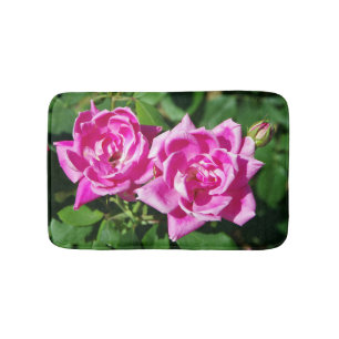 Twee roze badmat