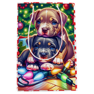 Twee Schattigee Puppies spelen onder de kerstboom Medium Cadeauzakje
