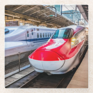 Twee Shinkansen op het Tokyo-station Glazen Onderzetter