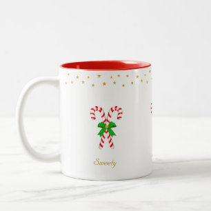 Twee snoepjes, gouden sterren en bewerkbare tekst tweekleurige koffiemok