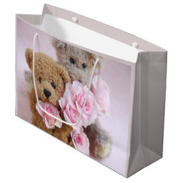 Twee teddyberen die rozen houden large cadeautasje
