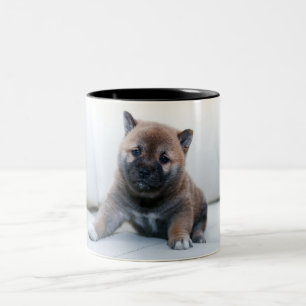 Twee tonde mok met puppy design.
