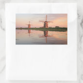 Twee windmolens met reflectie bij zonsondergang rechthoekige sticker (Tas)