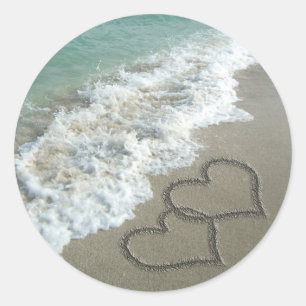 Twee zand harten op de strand, de Romantische Ocea Ronde Sticker