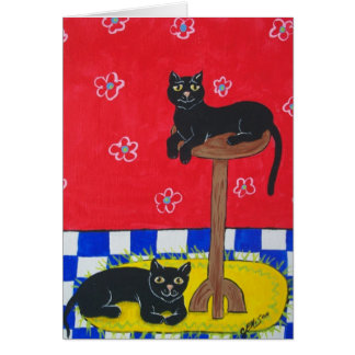 Twee zwarte katten
