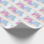 Tweeling babyjongen en meisje op de lijn cadeaupapier (Hoek)