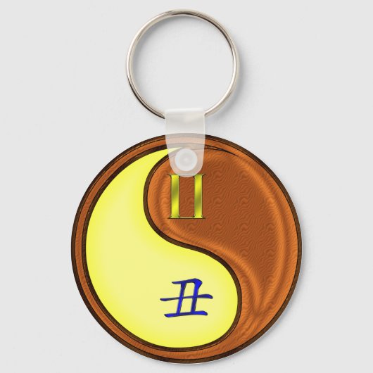 Tweelingen en houtossen sleutelhanger (Voorkant)